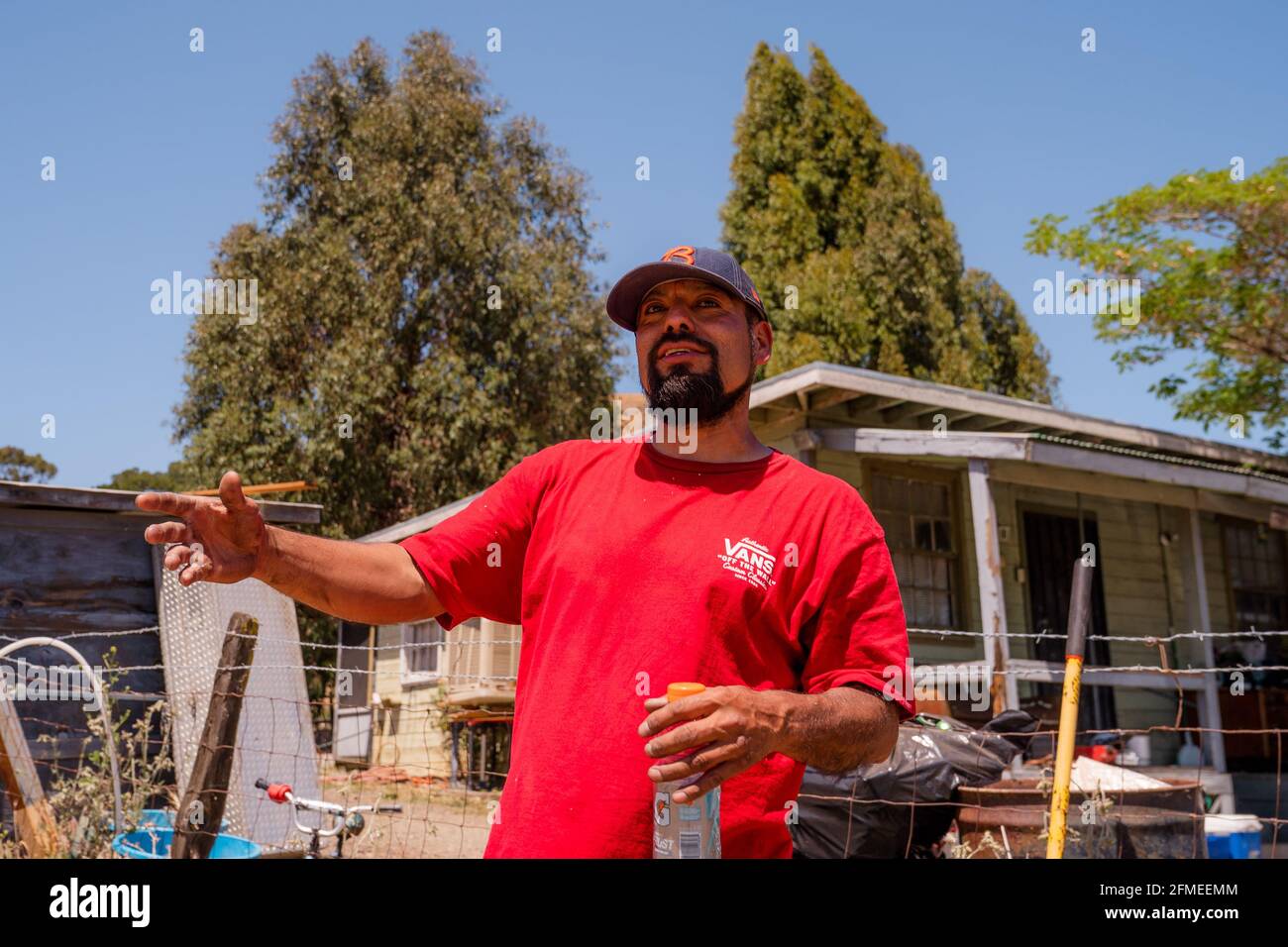 Benicia, CA, USA. 8th May, 2021. Rosenberg Blanco Rodriguez, 44, explains how the Lopes Fire started after a mower struck a rock and sparked a grass fire which quickly spread within several private properties off of Lopes Road in Benicia. Credit: Jungho Kim/ZUMA Wire/Alamy Live News Stock Photo