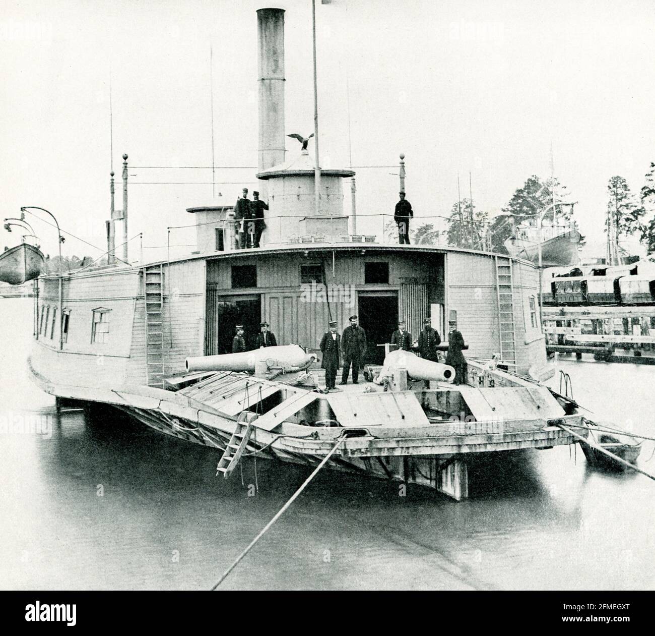 The 1912 caption reads: “The Commodore Perry - an old New York ferryboat became emergency gun boat  - has guns and pilot-houses armored with casement of iron plates for gunners.” The Commodore Perry (1858) was a 512 long tons (520 t) steamer acquired by the Union Navy during the first year of the American Civil War. Commodore Perry was outfitted as a gunboat with heavy guns and a large crew of 125 officers and enlisted personnel. Her powerful guns were capable of doing considerable damage to blockade runners or shore fortifications of the Confederate States of America. Stock Photo