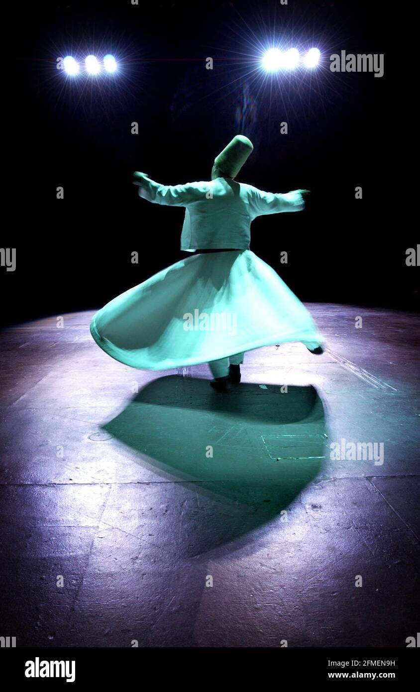 A Whirling Dervish from Turkey rehearses before tonights single performance at the Albert Hall.15 September 2002 photo Andy Paradise Stock Photo
