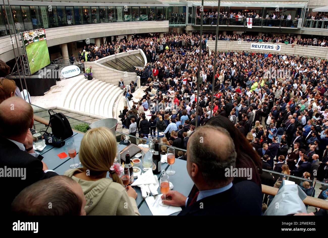 Crowds watching in the city of London, for the England V Argentina match in which England won 1-0.7 June 2002 photo Andy Paradise Stock Photo