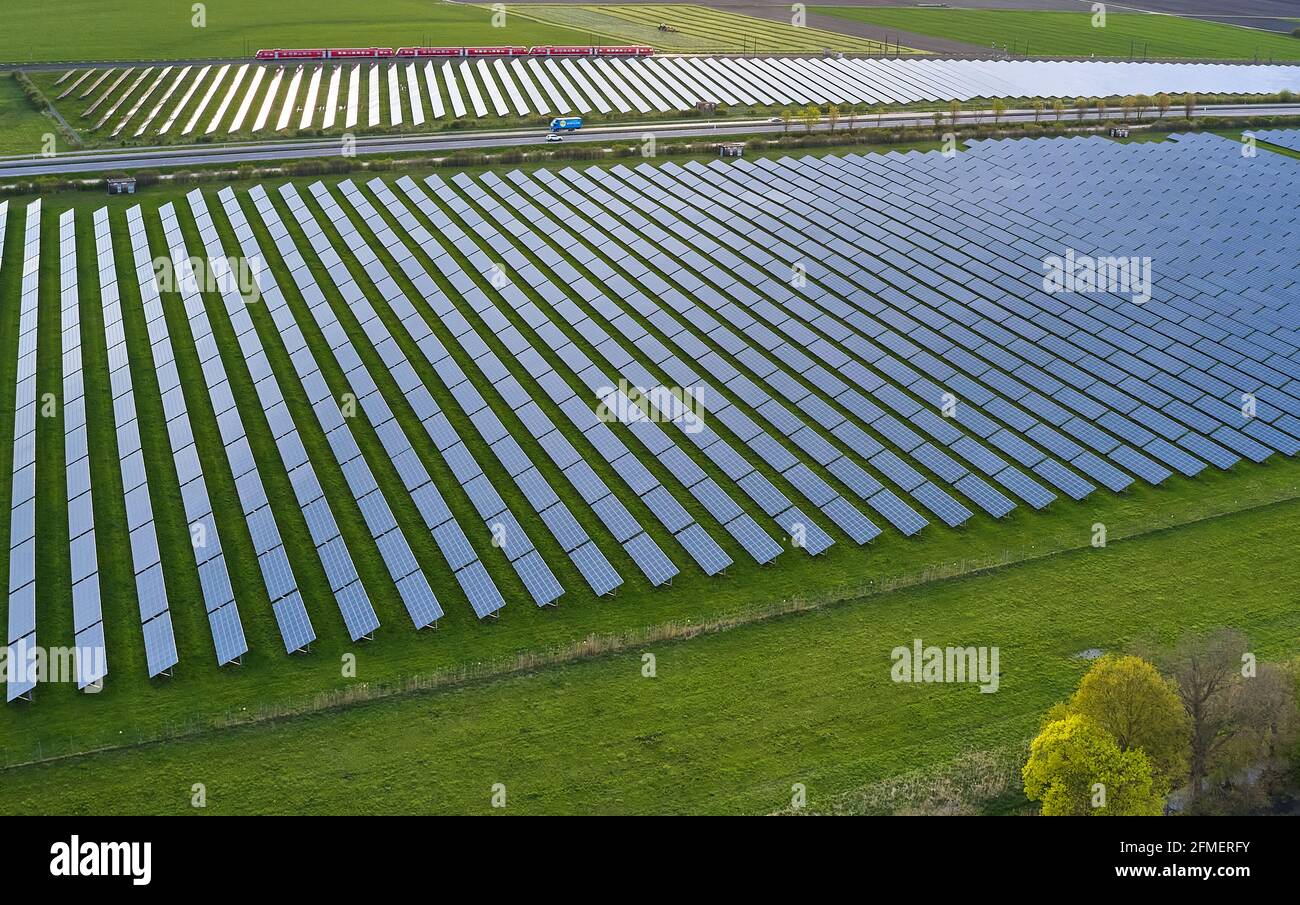 A Highway, train track and a Photovoltaic field together in Wertingen, Germany,  May 8, 2021. © Peter Schatz / Alamy Live News Stock Photo