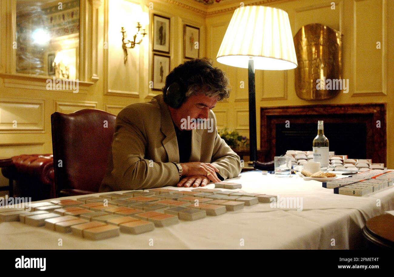 Dominic O'Brien in the middle of attempting to memorise 54 decks of cards (2808 cards) in twelve hours which would be the new world record if he succeeds.1 May 2002 photo Andy Paradise Stock Photo