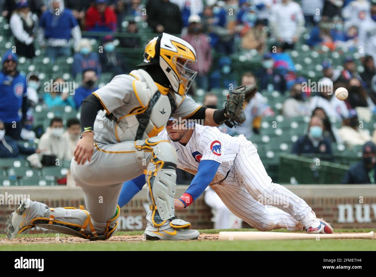 Chicago Cubs John Lackey (L) talks with Willson Contreras (C) and Anthony  Rizzo (R) in the fifth inning of a game against the St. Louis Cardinals at  Wrigley Field on September 15