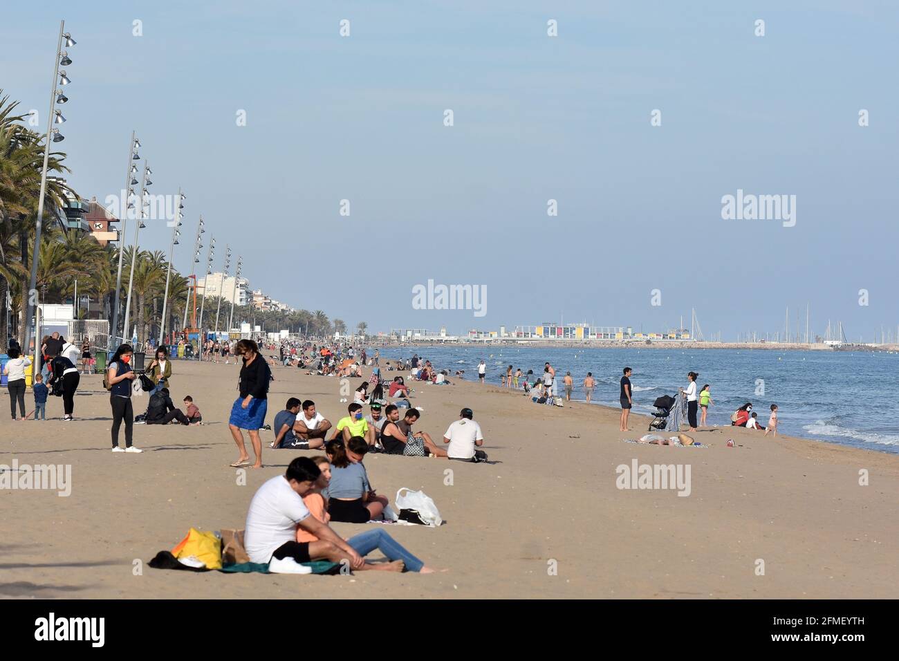 People seen enjoying at the beach in Calafell Tarragona. (Photo by