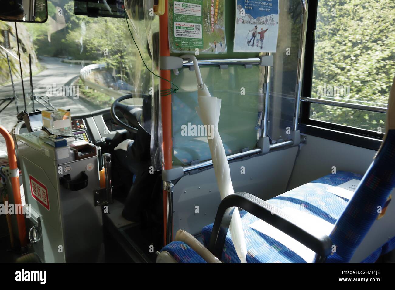 komagane, nagano, japan, 05-08-2021, Bus to Komagatake ropeway. The first two seats are kept empty as precaution measure for infection. Stock Photo