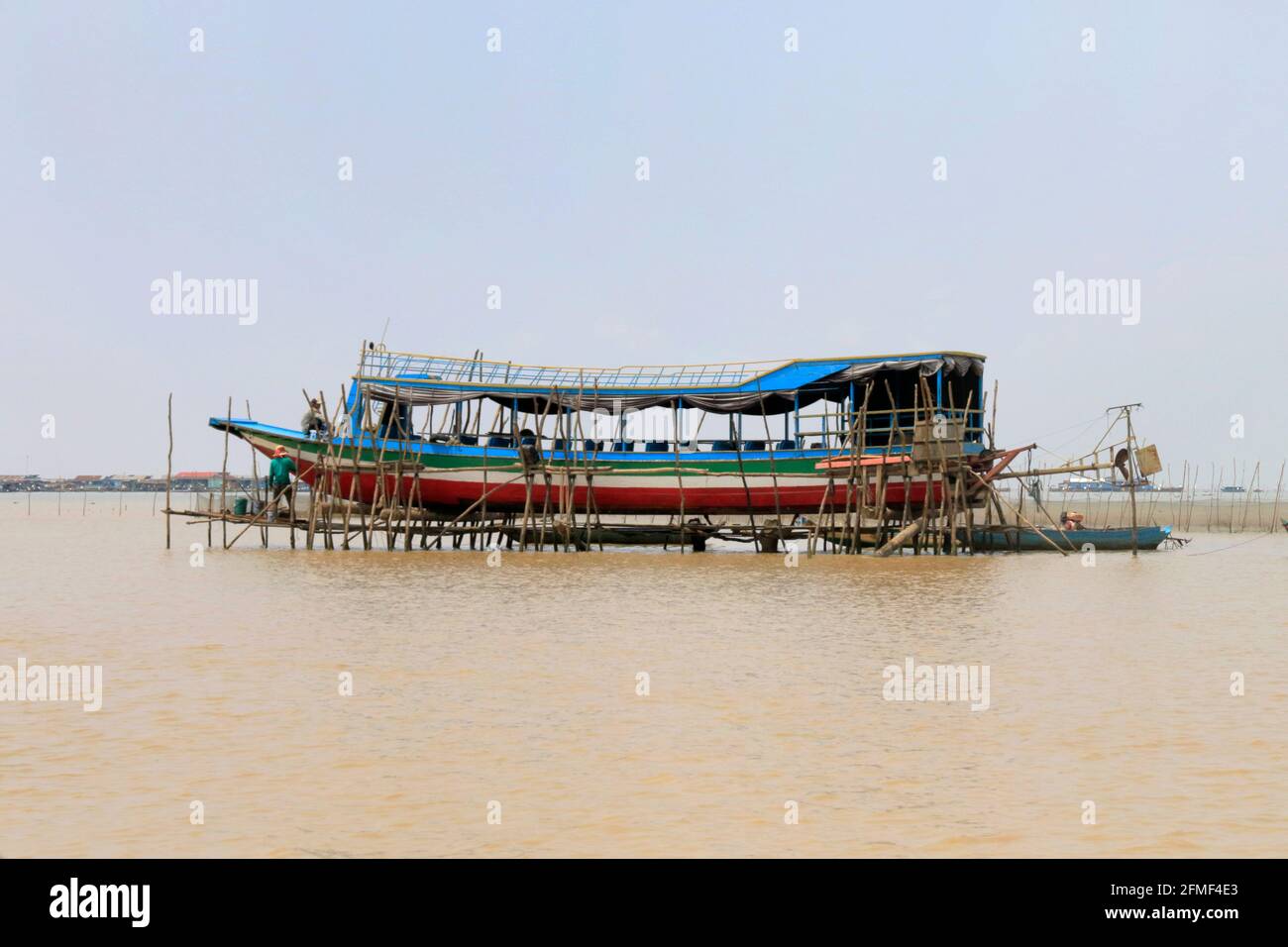 Maintenance of a boat on the Lake Tonle Sap Siem Reap province Cambodia Stock Photo