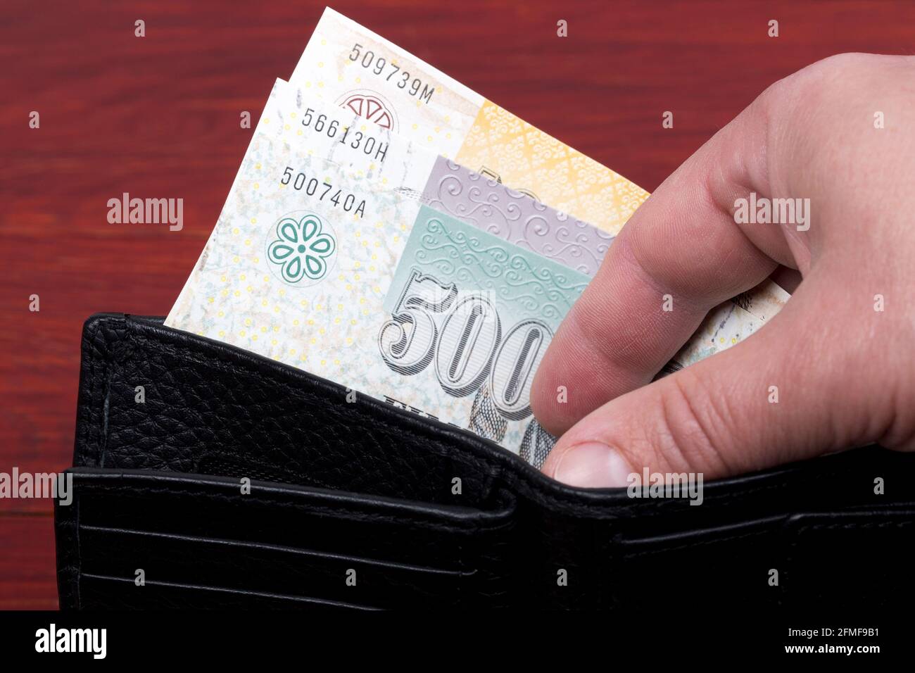 Faroese krona in the black wallet Stock Photo - Alamy