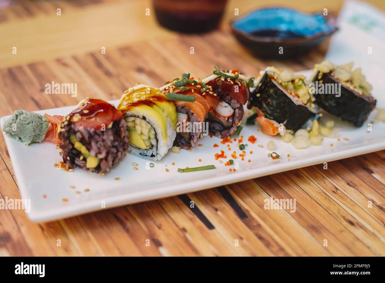 Japanese dish with assorted sushi served on a terrace in a Gerona street Stock Photo