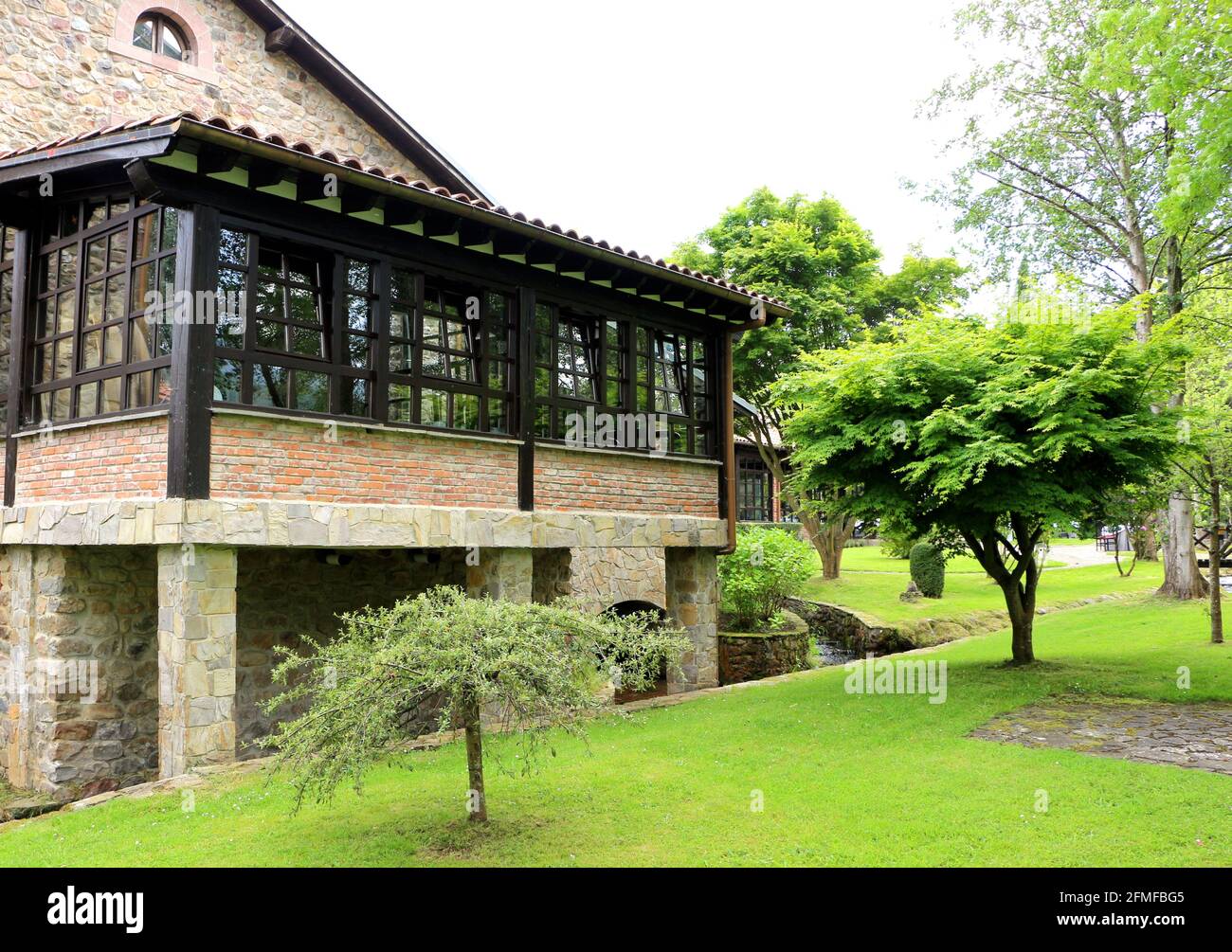 Los Molinos restuarant gardens Ruente Cantabria Spain Stock Photo