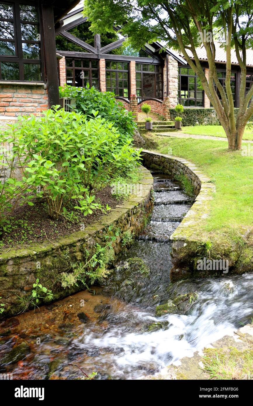 Los Molinos restuarant gardens Ruente Cantabria Spain Stock Photo