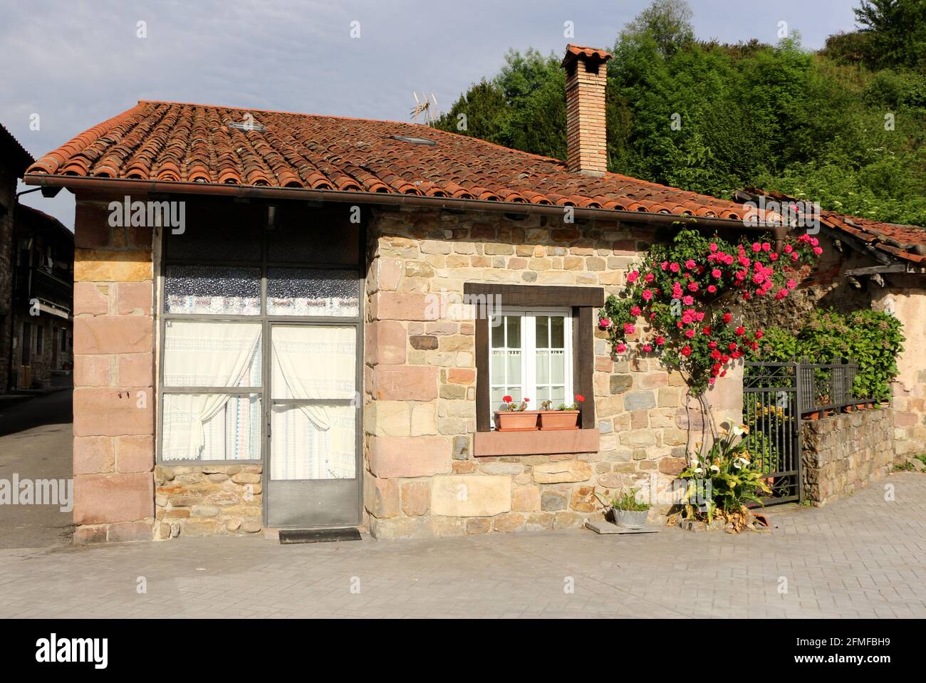 Small traditional stone construction house in Ruente Cantabria Spain Stock Photo