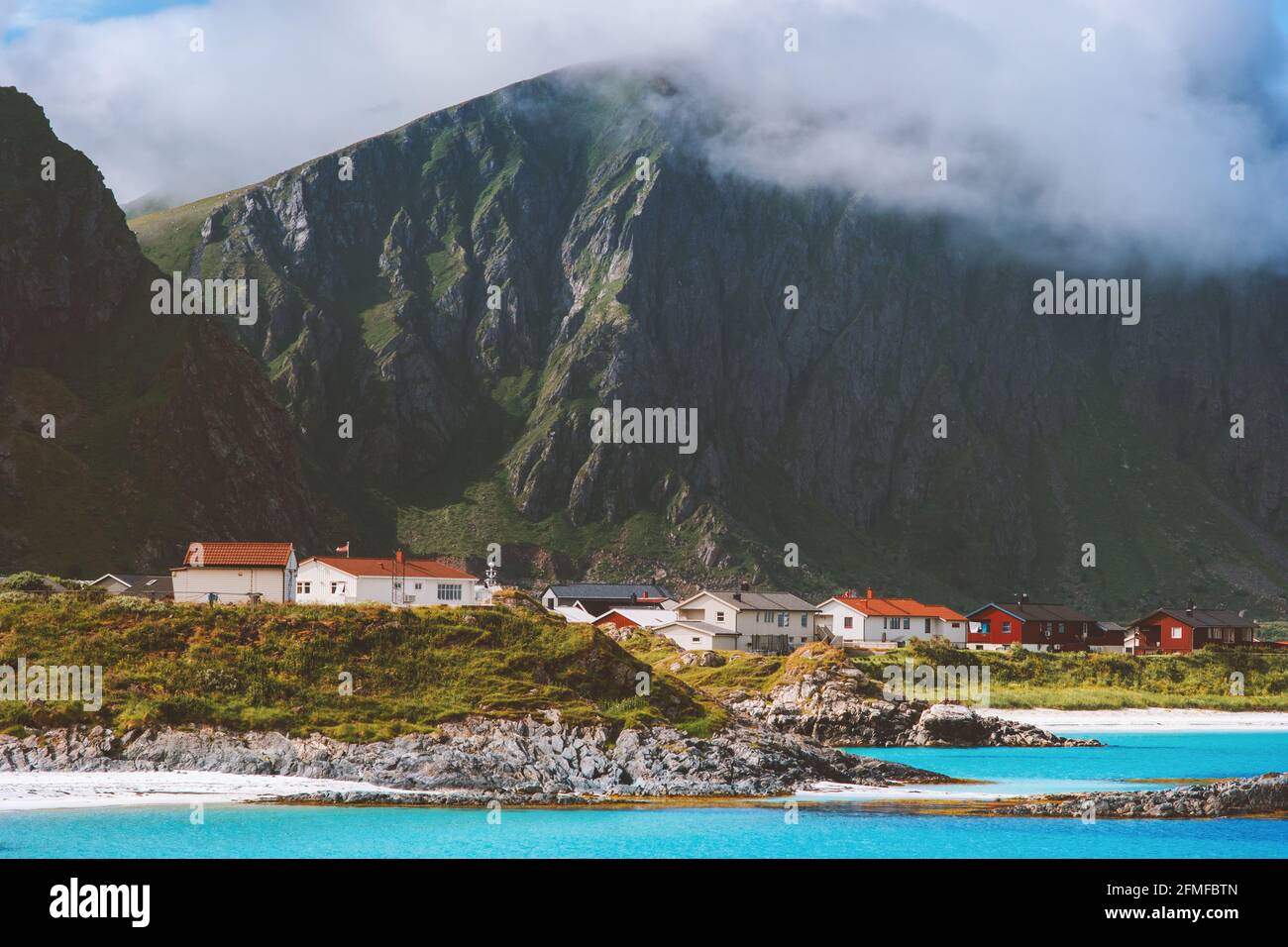 Mountains and ocean coastal Andenes city in Norway landscape summer travel destinations nature scenery Vesteralen islands Stock Photo