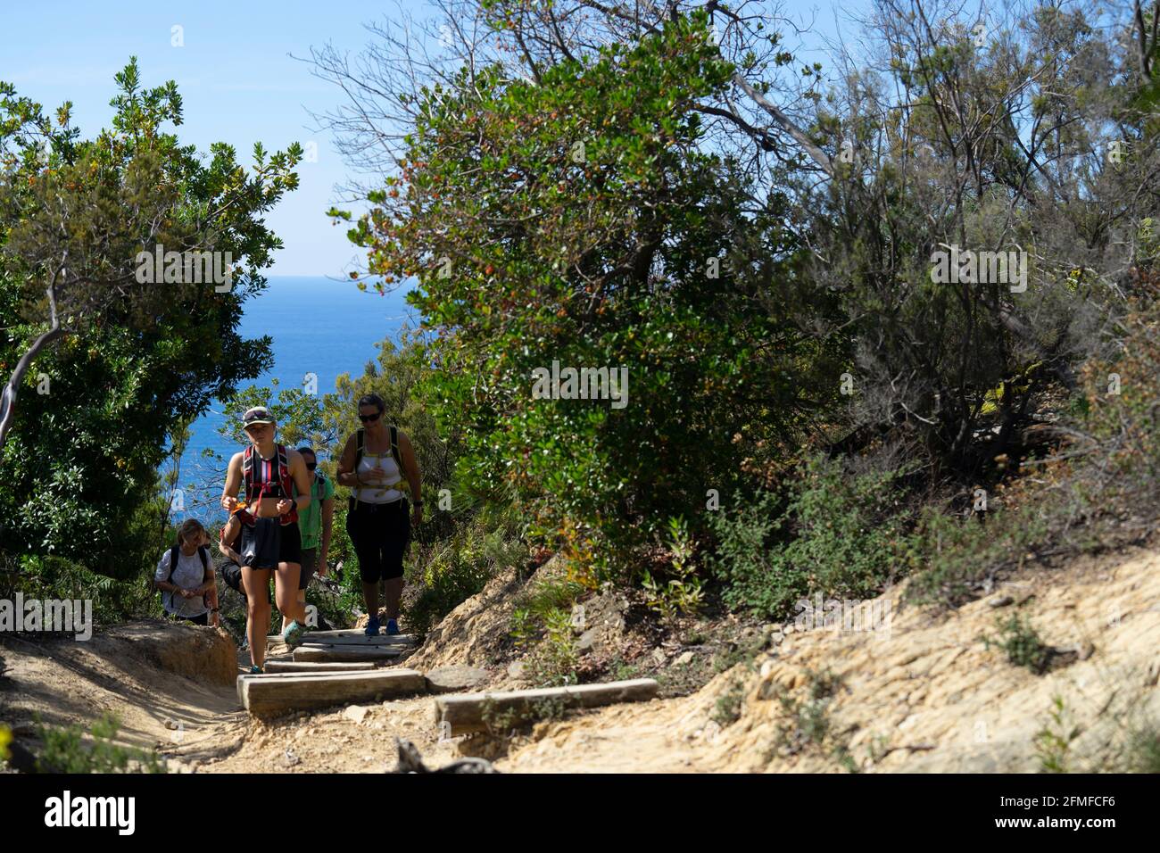 Tourists visiting Cinque Terre National Park, Italy - Turisti nel Parco Nazionale delle Cinque Terre, Italia Stock Photo