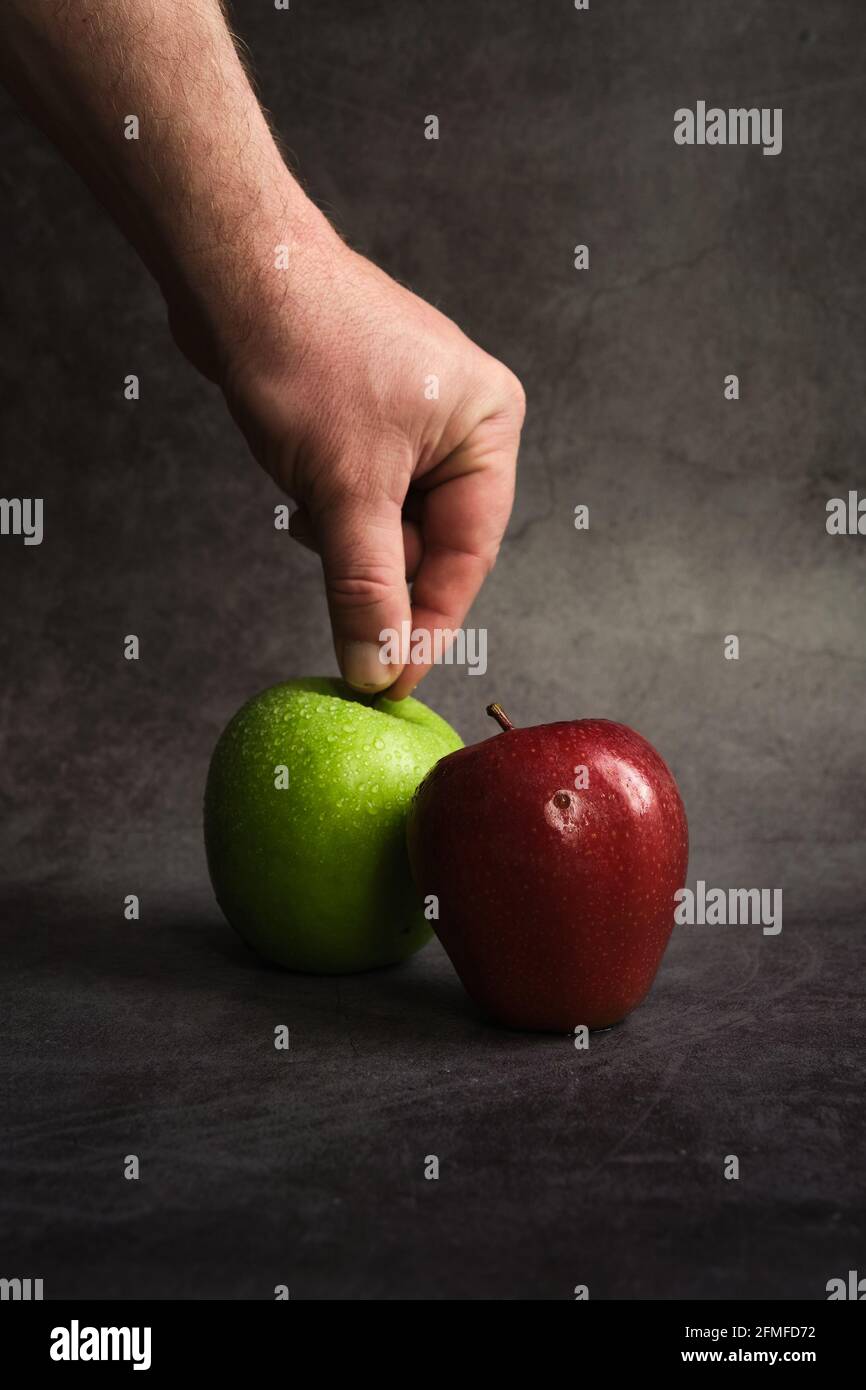 green and red apples on a dark background Stock Photo