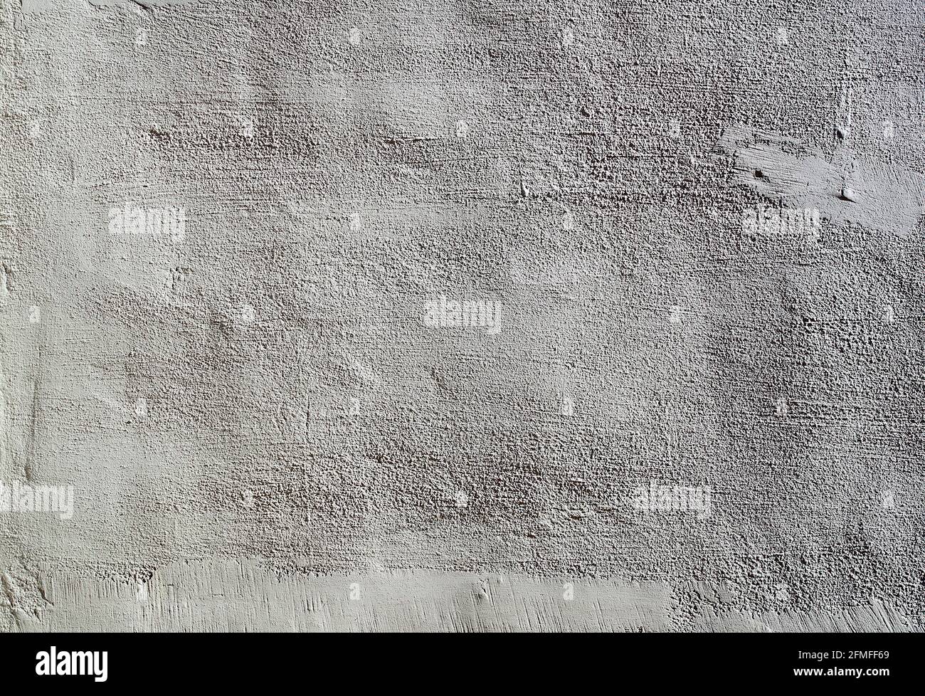 Heavily textured white and grey external plastered wall Stock Photo Alamy