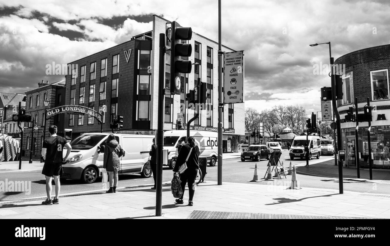 Kingston Upon Thames London, May 07 2021, Modern Architecture Of A Student Accommodation Apartments At A High Street Road Junction With People and Car Stock Photo