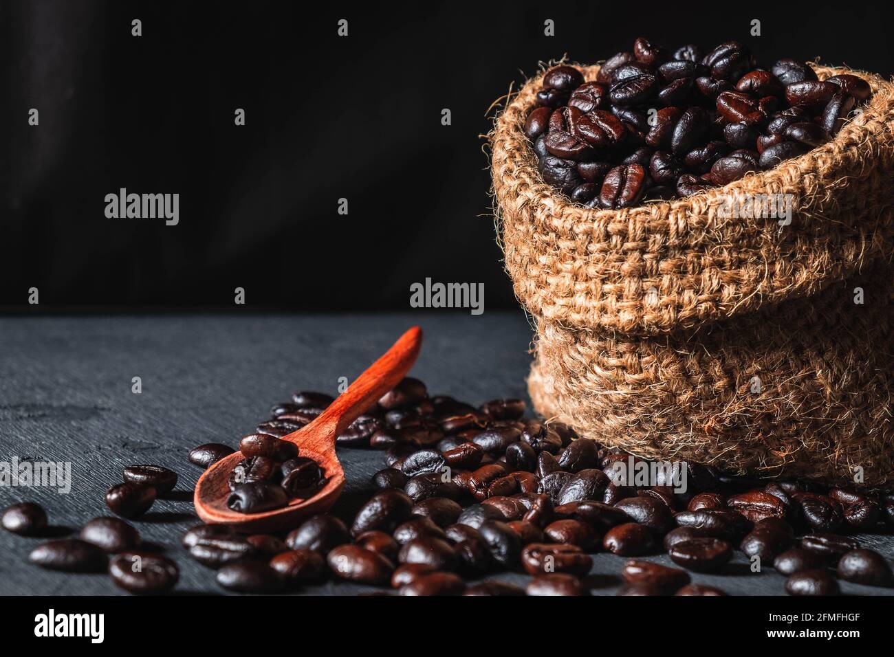 Raw coffee beans in a sack bag Stock Photo - Alamy