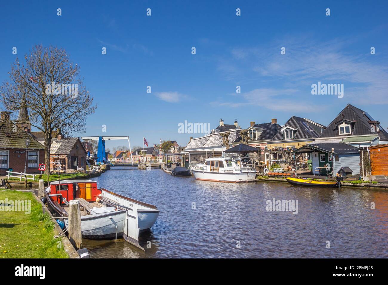 Boats in the central canal of small town Warten, Netherlands Stock Photo
