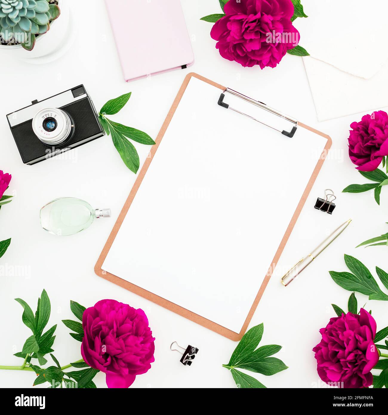 Home office composition. Freelancer workspace with clipboard, diary