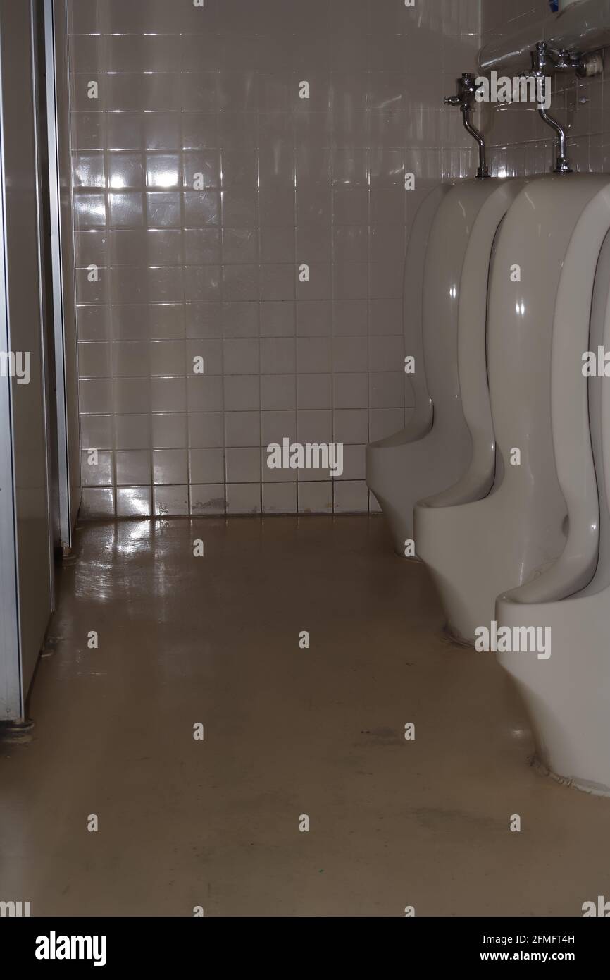 Male toilets hi-res stock photography and images - Alamy