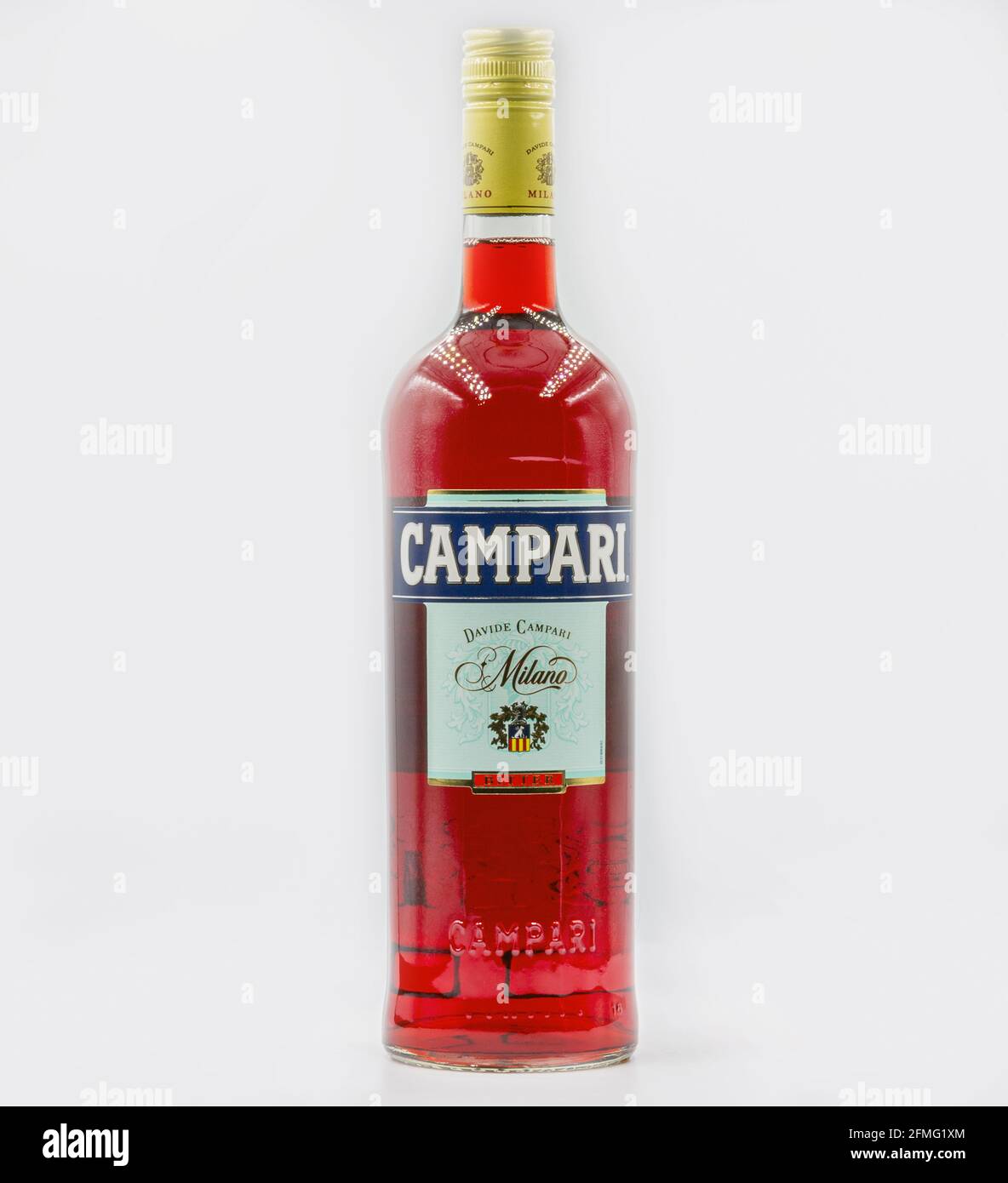 KYIV, UKRAINE - FEBRUARY 20, 2021: Bottle of Campari Bitter Liqueur closeup against white. Classic Italian bitter liqueur is made using a blend of her Stock Photo