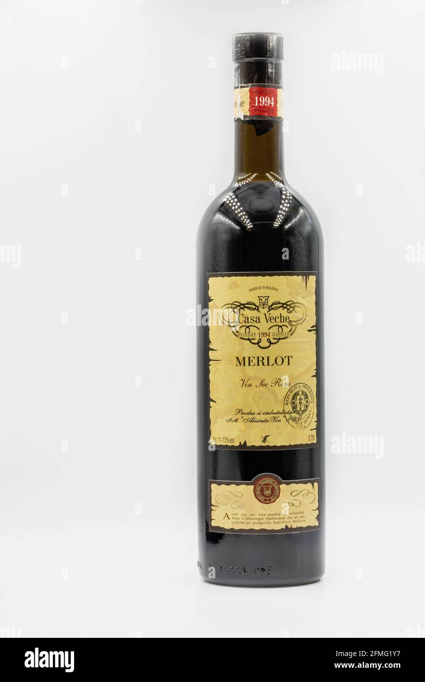 KYIV, UKRAINE - FEBRUARY 27, 2021: Merlot red wine bottle from Casa Veche Moldavian winery closeup against white background. Stock Photo