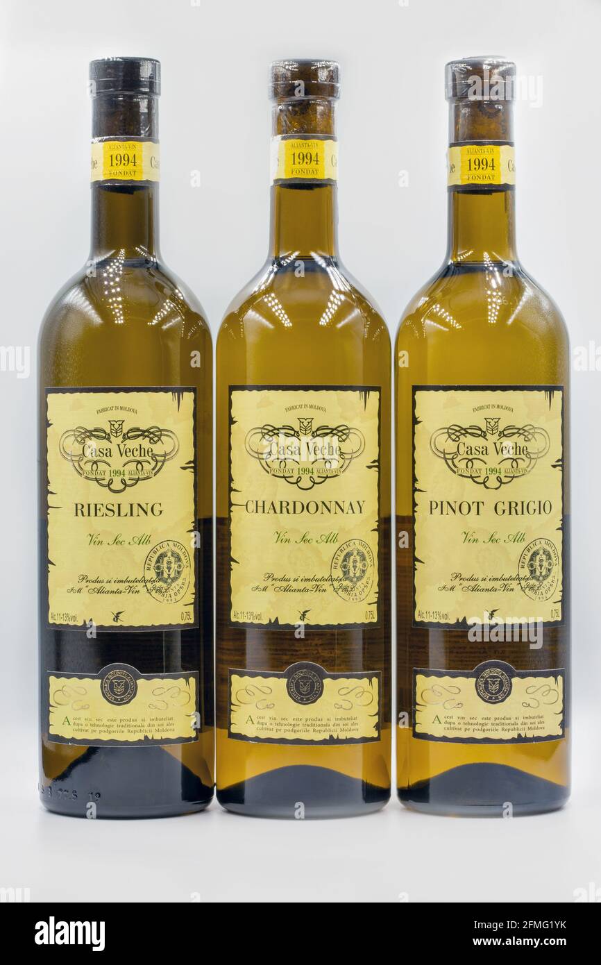 KYIV, UKRAINE - FEBRUARY 27, 2021: Riesling, Chardonnay and Pinot Grigio white dry wine bottles from Casa Veche Moldavian winery closeup against white Stock Photo