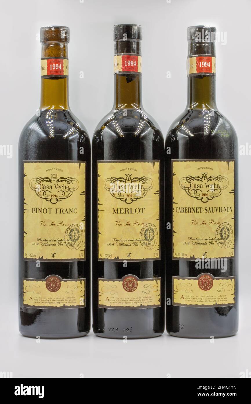 KYIV, UKRAINE - FEBRUARY 27, 2021: Set of Pinot Franc, Merlot and Cabernet Sauvignon red wine bottles from Casa Veche Moldavian winery closeup against Stock Photo