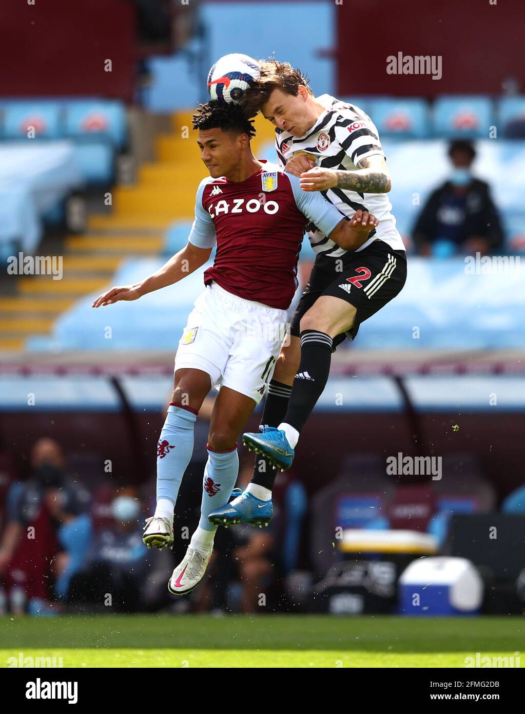 Aston Villa's Ollie Watkins (left) and Manchester United's Victor Lindelof battle for the ball during the Premier League match at Villa Park, Birmingham. Picture date: Sunday May 9, 2021. Stock Photo