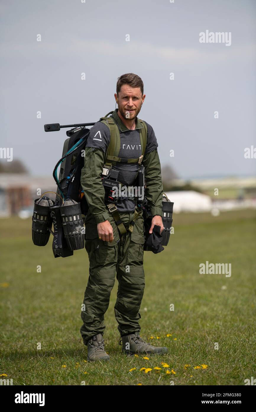 Richard Browning, founder of Gravity Industries, takes flight in his body-controlled jet-powered suit at Old Sarum Airfield, Salisbury, Wiltshire. Stock Photo