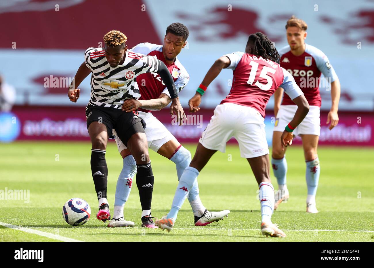 Manchester United's Paul Pogba (left) and Aston Villa's Ezri Konsa battle for the ball during the Premier League match at Villa Park, Birmingham. Picture date: Sunday May 9, 2021. Stock Photo
