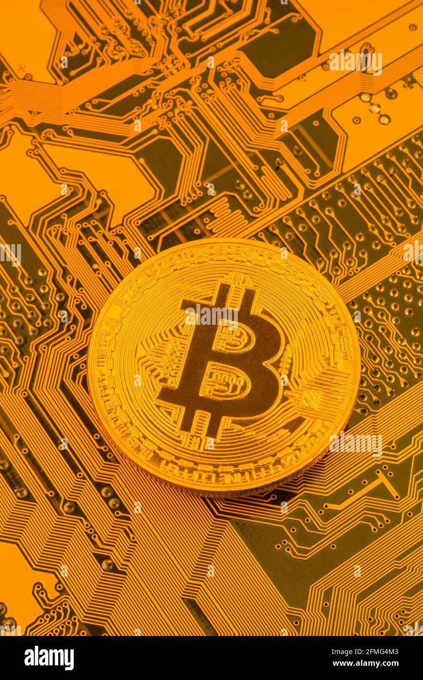 Cryptocurrency gold Bitcoin token and PCB motherboard / PC circuit. For  digital currency security, cryptojacking, cryptocurrency crash, Bitcoin  price Stock Photo - Alamy