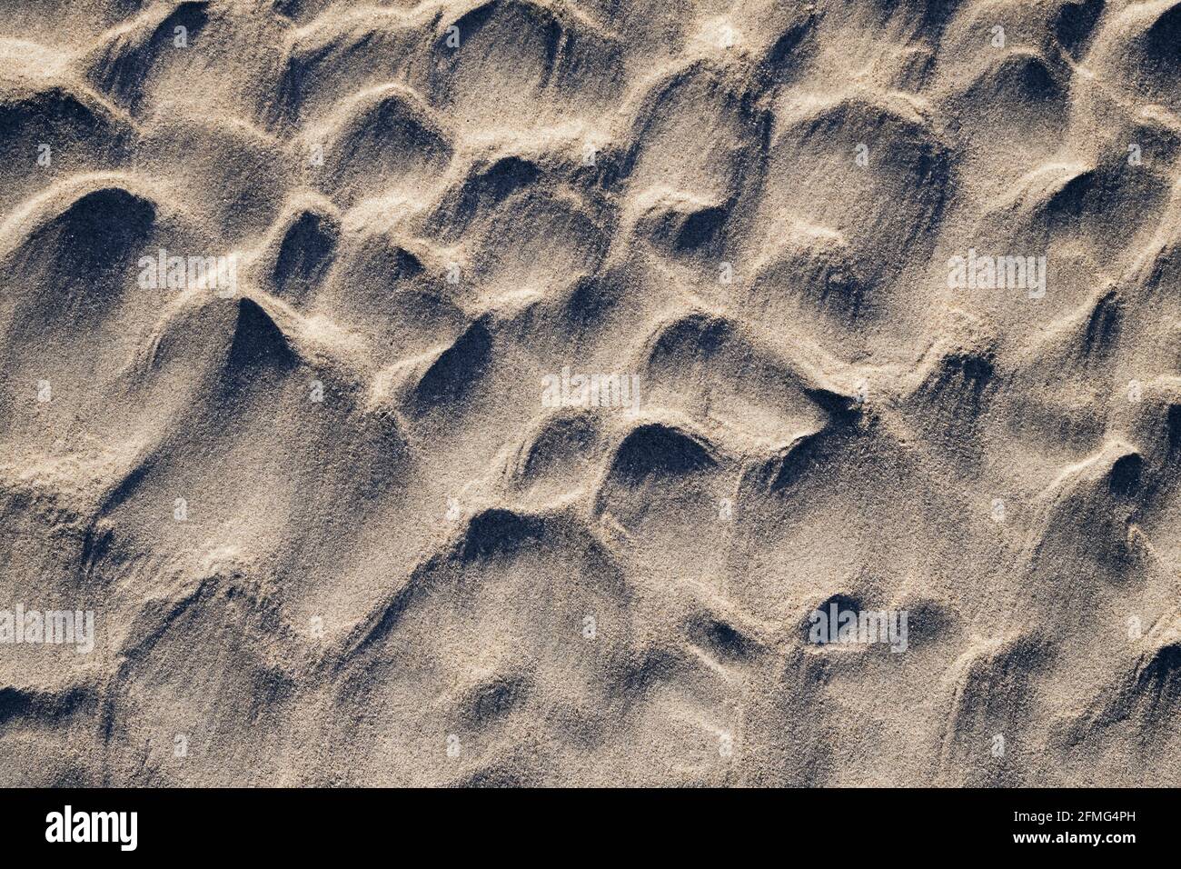 Natural sand sculptures on the beach. Stock Photo