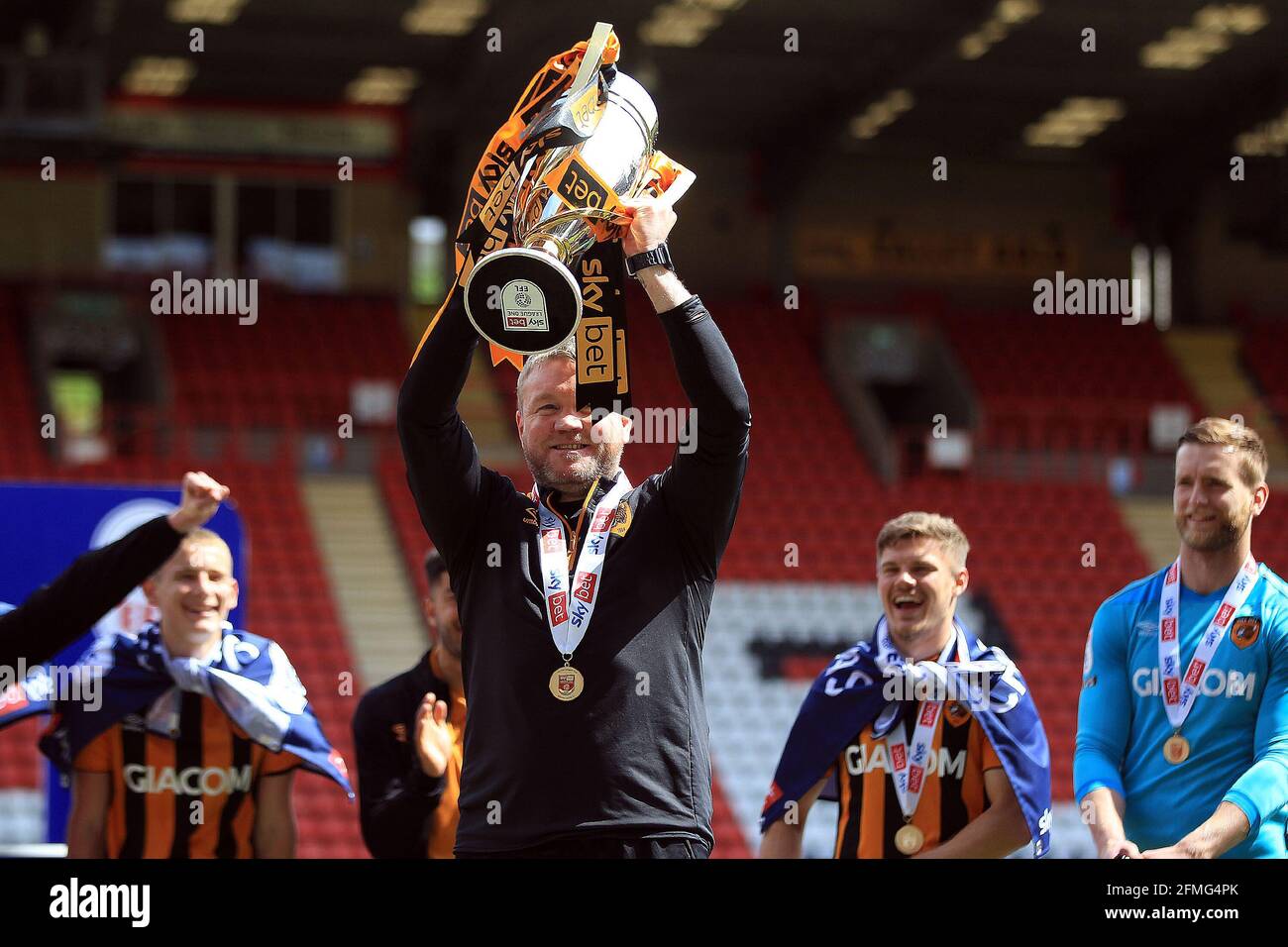 London, UK. 09th May, 2021. Hull City Manager Grant McCann lifts the League one championship trophy. EFL Skybet football league one match, Charlton Athletic v Hull City at the Valley in London on Sunday 9th May 2021. this image may only be used for Editorial purposes. Editorial use only, license required for commercial use. No use in betting, games or a single club/league/player publications. pic by Steffan Bowen/Andrew Orchard sports photography/Alamy Live news Credit: Andrew Orchard sports photography/Alamy Live News Stock Photo