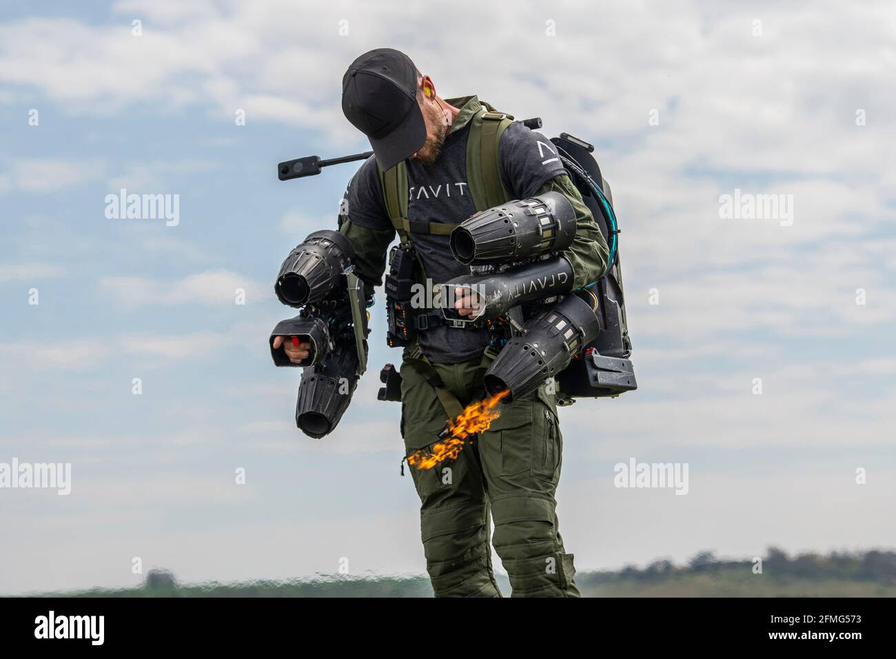 Richard Browning, founder of Gravity Industries, takes flight in his body-controlled jet-powered suit at Old Sarum Airfield, Salisbury, Wiltshire. Stock Photo