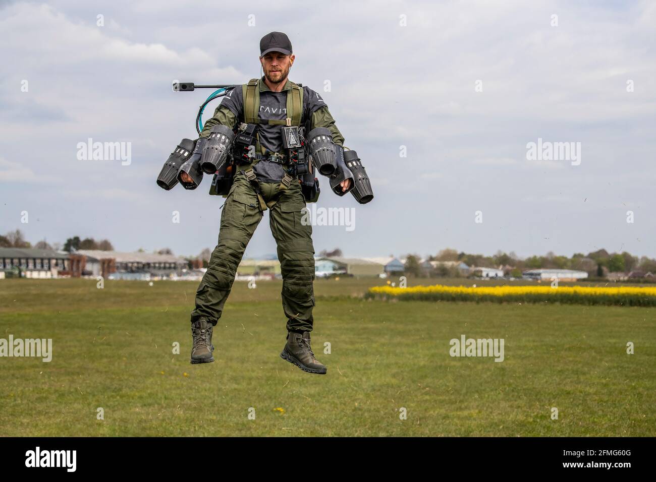 Richard Browning, founder of Gravity Industries, takes flight in his body-controlled jet-powered suit at Old Sarum Airfield, Salisbury, Wiltshire. Stock Photo