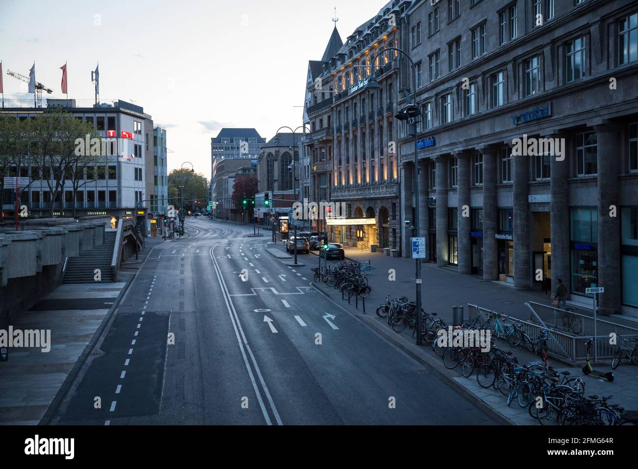 curfew from 9 pm during corona pandemic lockdown on May 5th. 2021. The deserted street Trankgasse near the cathedral, Cologne, Germany.  Ausgangssperr Stock Photo