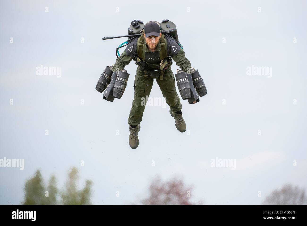 Richard Browning, founder of Gravity Industries, takes flight in his body-controlled jet-powered suit at Old Sarum Airfield, Salisbury, Wiltshire. Stock Photo
