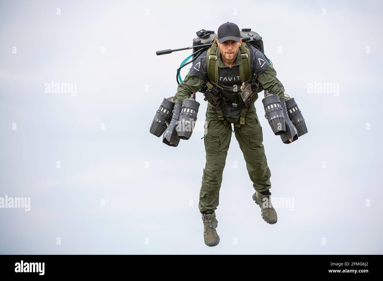 Richard Browning, founder of Gravity Industries, takes flight in his body-controlled jet-powered suit at Old Sarum Airfield, Salisbury, Wiltshire. Stock Photo