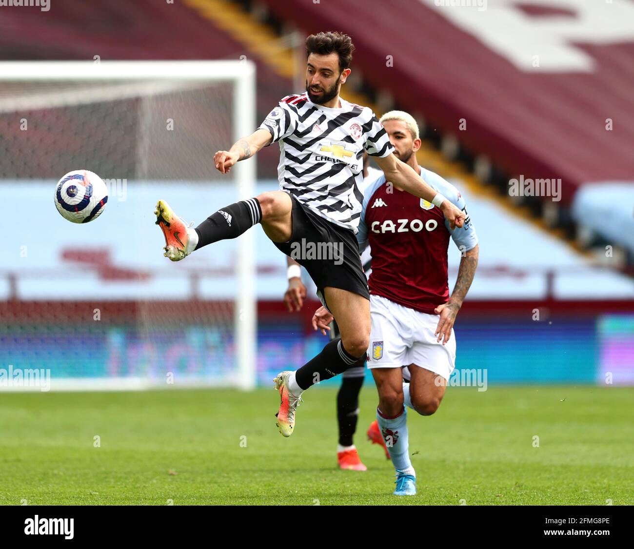 Manchester United's Bruno Fernandes controls the ball during the Premier League match at Villa Park, Birmingham. Picture date: Sunday May 9, 2021. Stock Photo