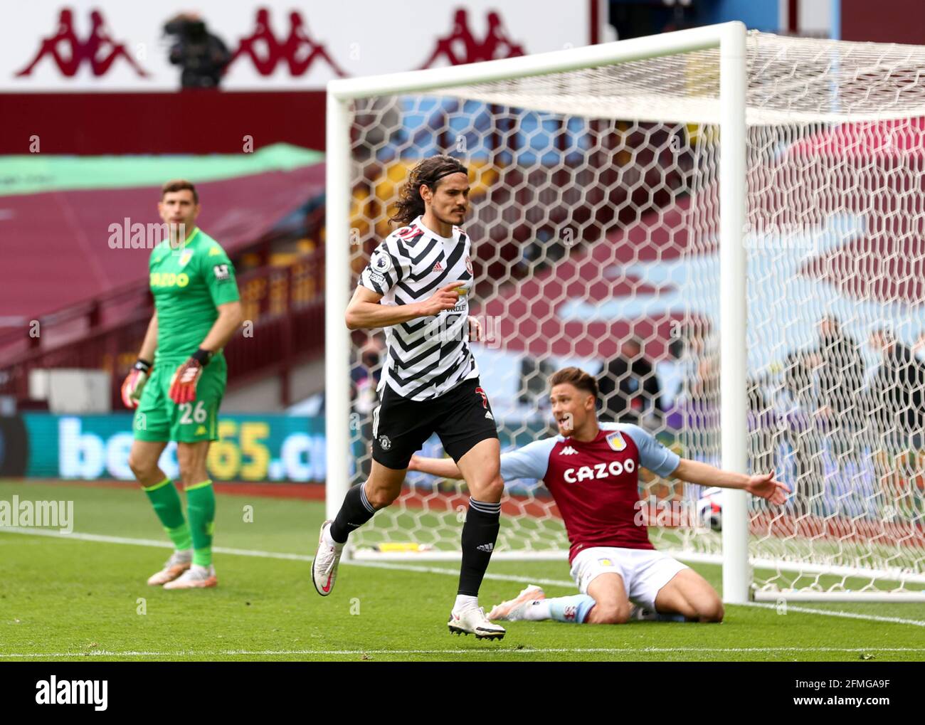 Manchester United's Edinson Cavani celebrates scoring their side's third goal of the game during the Premier League match at Villa Park, Birmingham. Picture date: Sunday May 9, 2021. Stock Photo