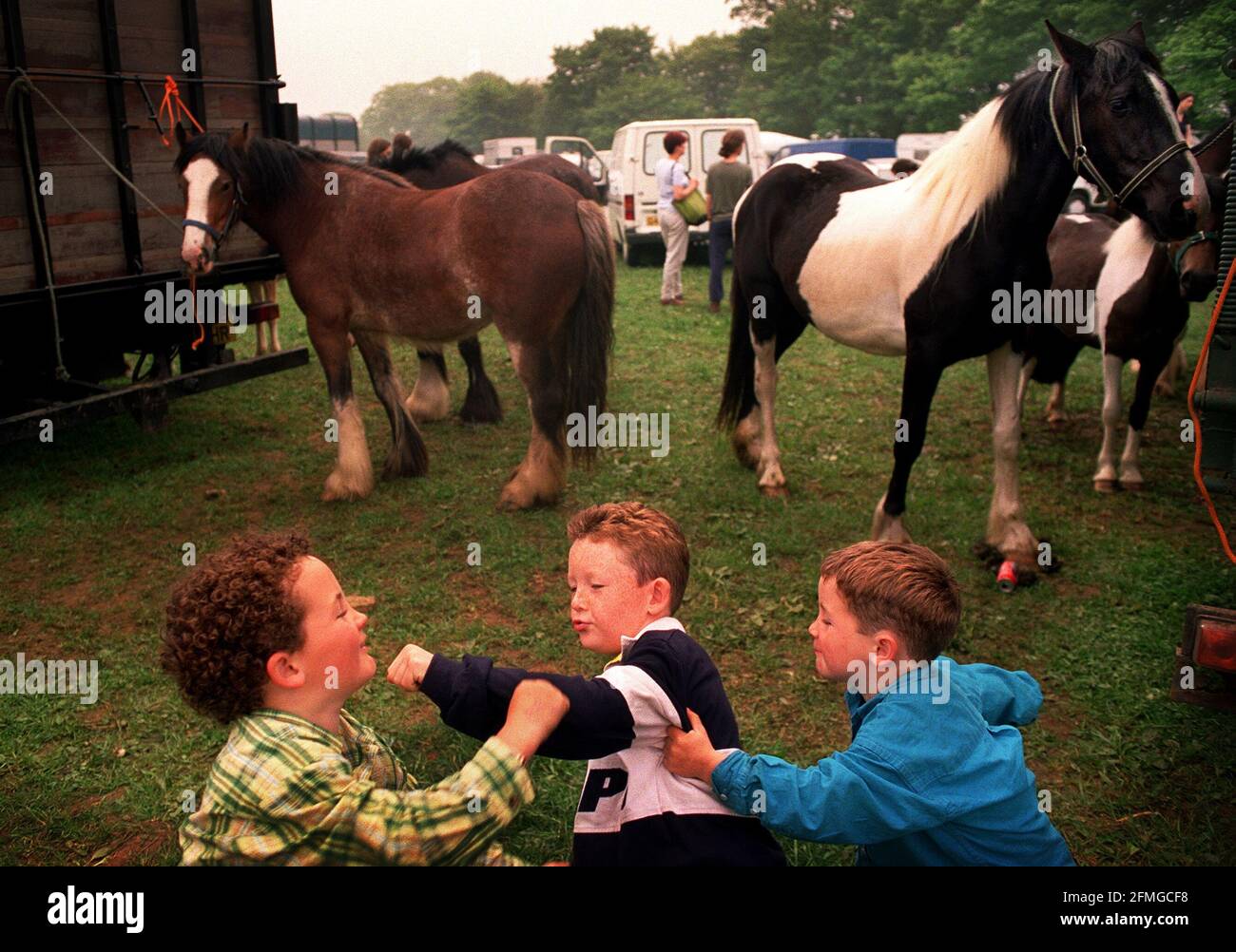 Stow On The Wold Horse FairYOUNG BOYS HAVING A LIGHT HEARTED FIGHT AT