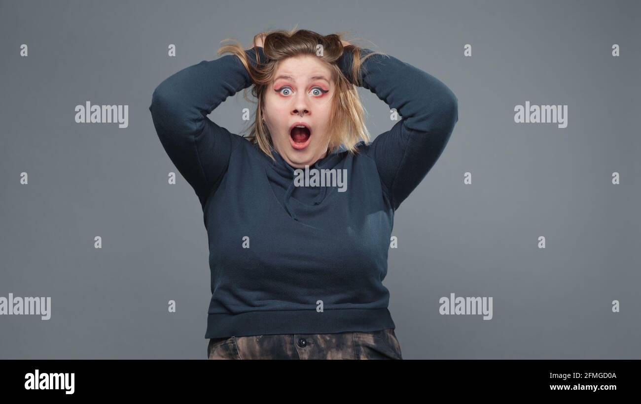 Photo of mad stout woman in sweatshirt Stock Photo