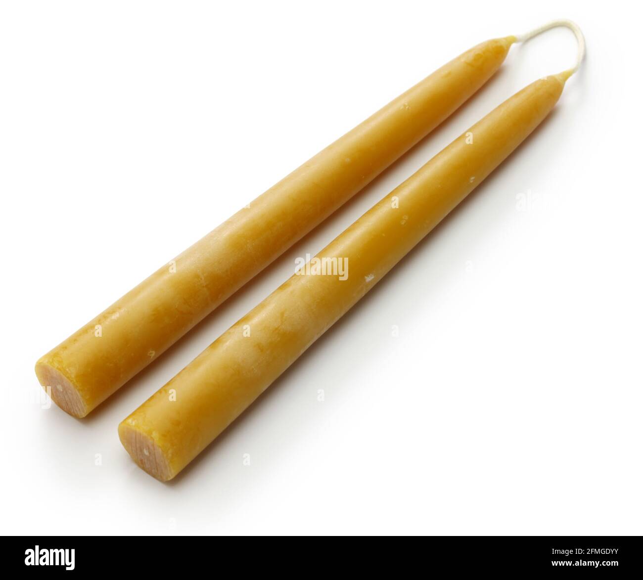 hand dipped beeswax taper candle Stock Photo Alamy