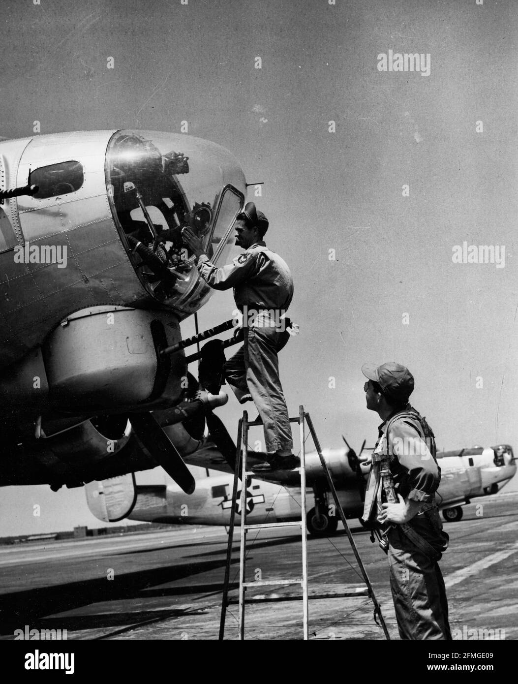 Inspecting B-17 Before Flight - July 1944 Stock Photo