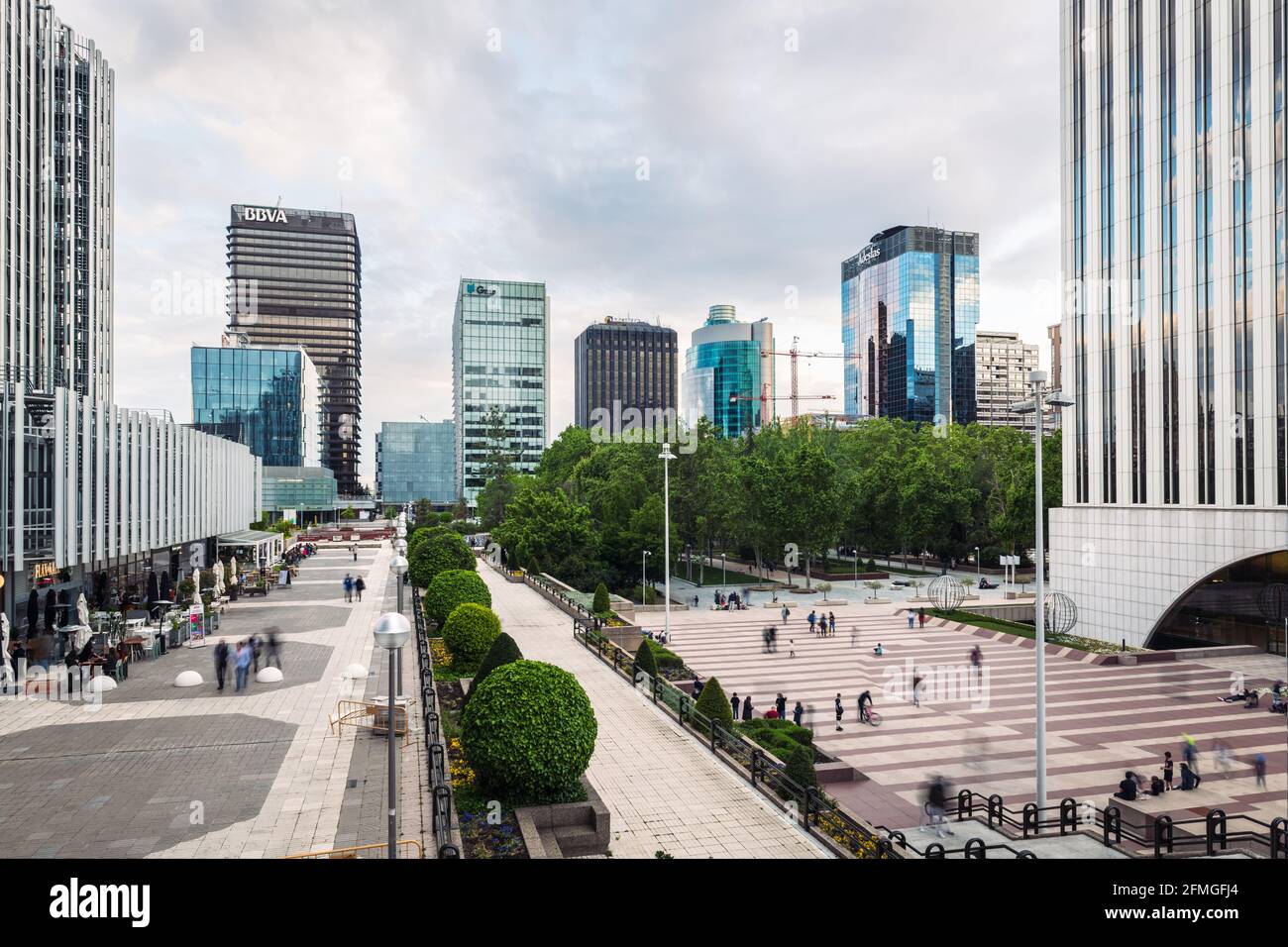 MADRID - MAY 1, 2021: Wide-angle view of AZCA business and financial district in Madrid at dusk, Spain. Long exposure. Stock Photo