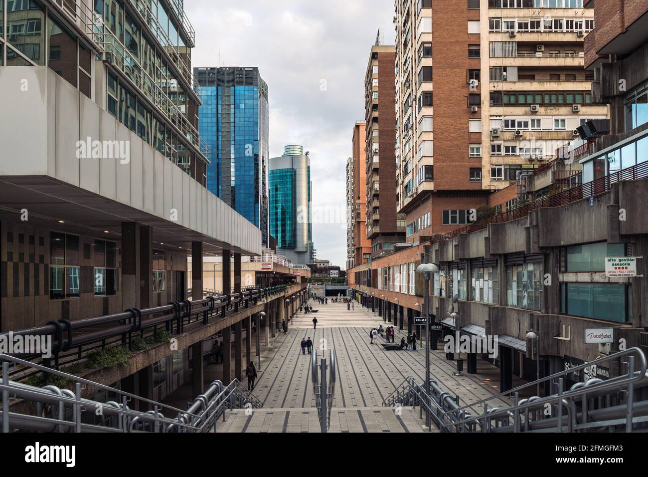 MADRID - MAY 1, 2021: Wide-angle view of the alleys and modern buildings in the AZCA business and financial district in Madrid, Spain. Stock Photo
