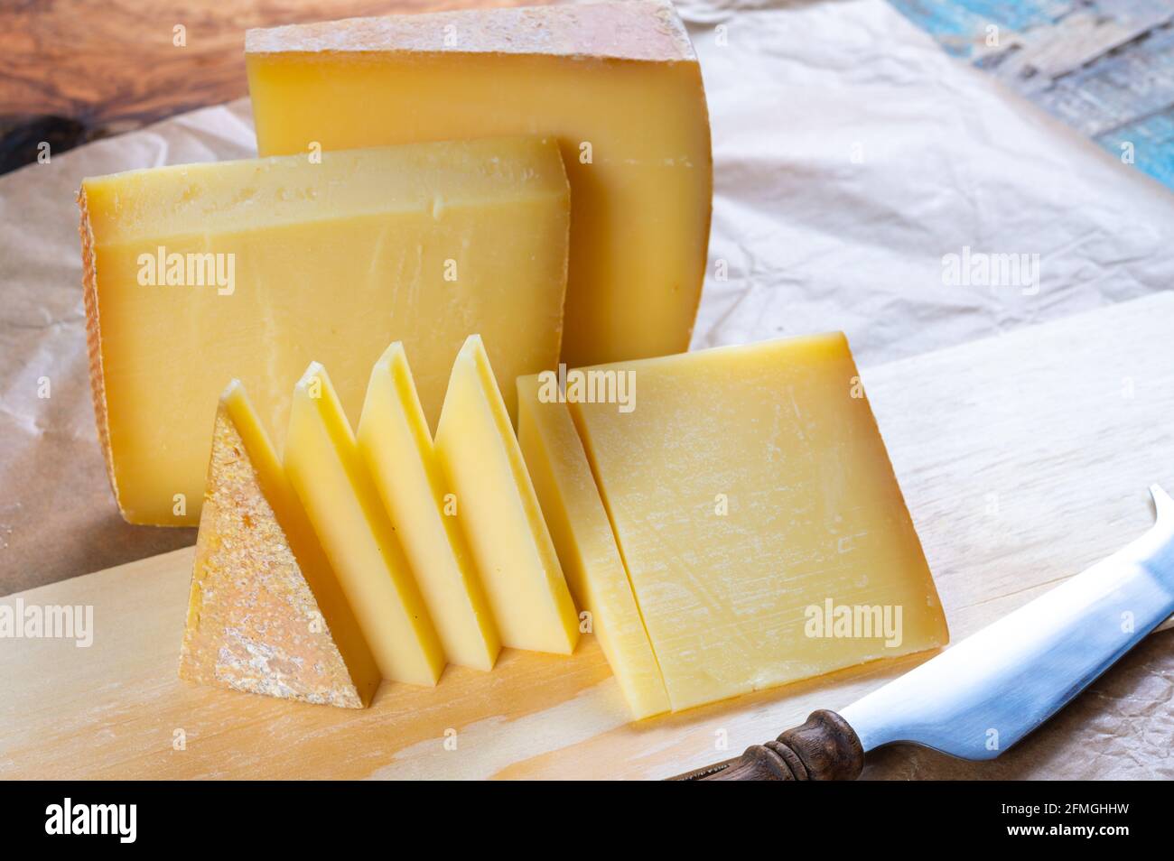 Cheese collection, French comte and Swiss gruyere cheeses close up