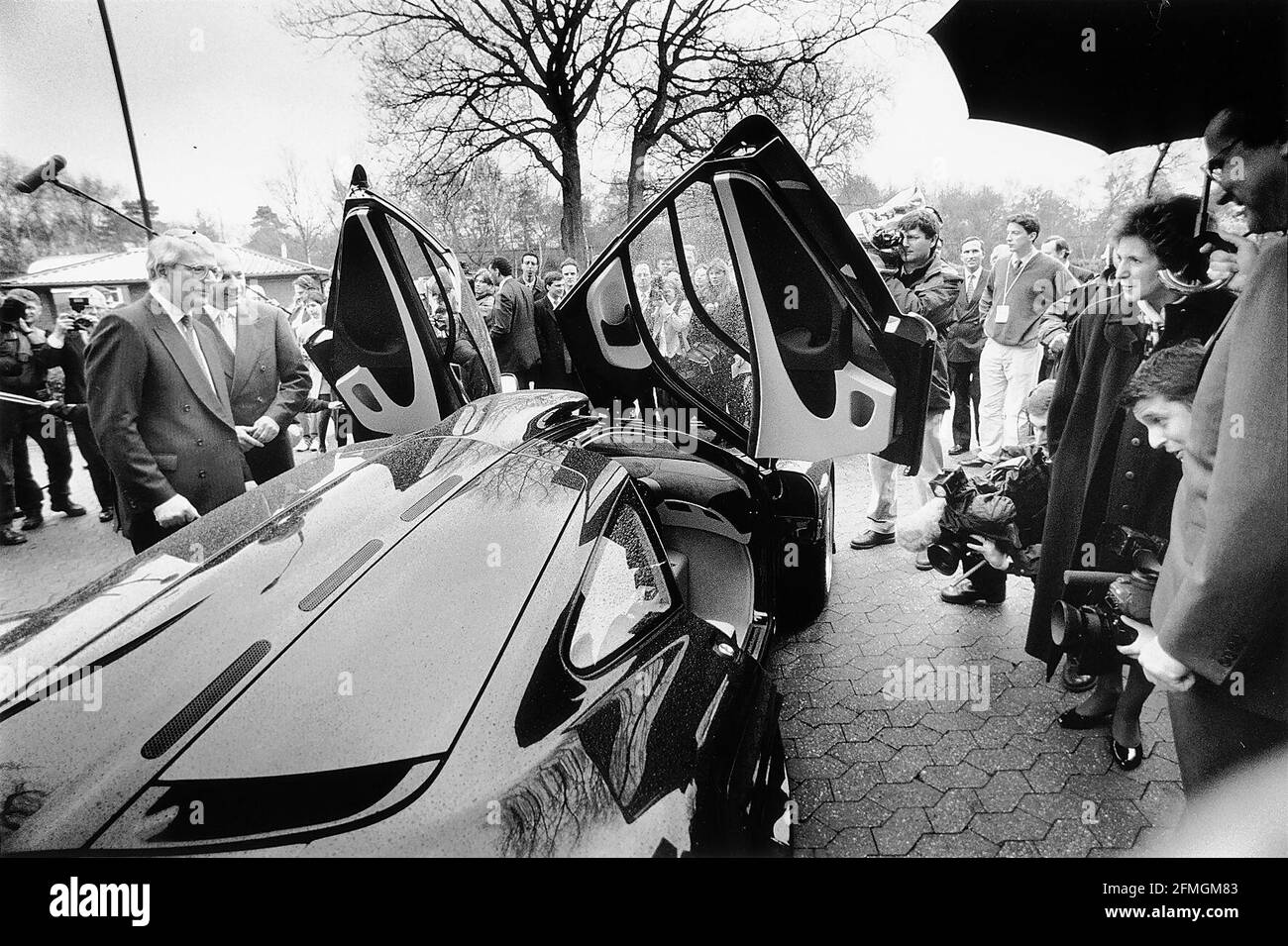 John Major and his wife Norma  right viewing an ¿800000 McLaren GT car at the Formula One teams plant near Woking Stock Photo
