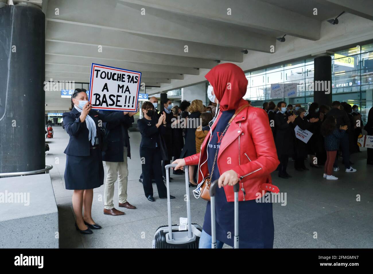 In Toulouse (France), a collective of Air France flight crews (PNC) and  families gathered in front of Blagnac airport on May 9, 2021. The airline  plans to close its three provincial bases